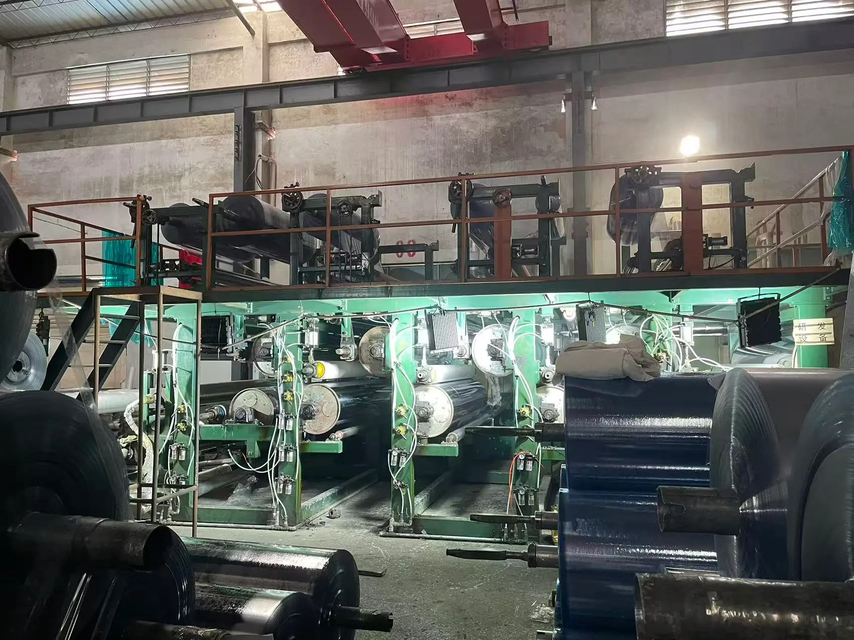 Winter PVC four-roll calendering production line — on-site photograph